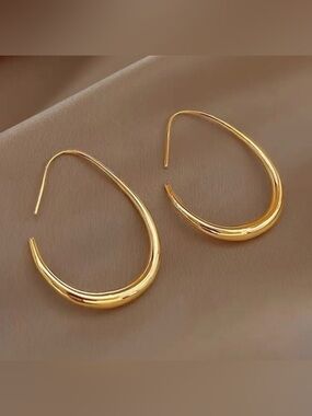 Anthropologie Polished Gold Crescent Hoop Earrings